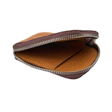 9 of 9:Brown leather wallet with zipper on a white background