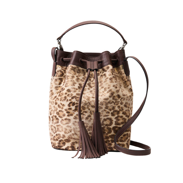 Leopard print bucket bag with brown leather accents on a white background