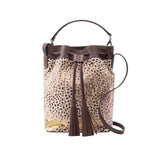 1 of 7:Leopard print bucket bag with brown leather accents on a white background