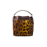 13 of 29:Leopard print handbag with brown leather accents on a white background