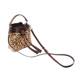 5 of 29:Leopard print handbag with brown leather accents on a white background
