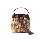 1 of 29:Leopard print bucket bag with brown leather accents on a white background