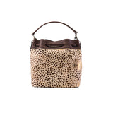 20 of 29:Leopard print handbag with brown leather accents on a white background