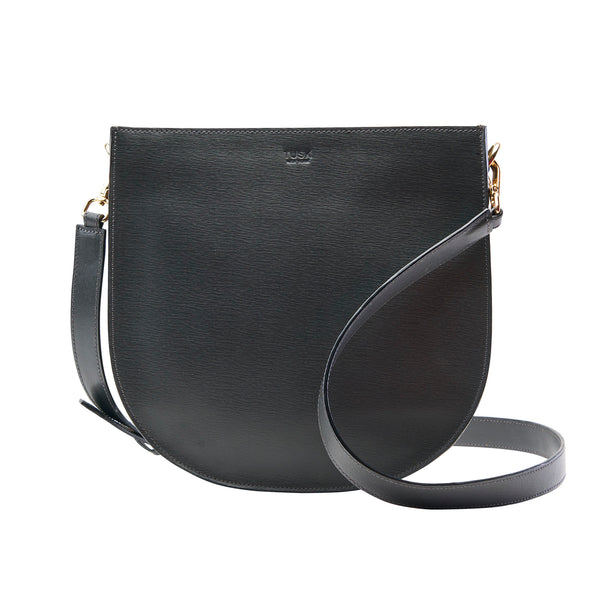 A greyleather Madison Seema Saddle Bag with a zipper main compartment, a strap, and gold-tone hardware.