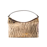 1 of 17:Handbag with zebra print pattern on a white background