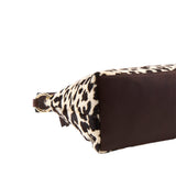 17 of 17:Brown bottom of hobo with leopard print strap on a white background