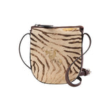 1 of 15:Small crossbody bag with zebra print pattern on a white background