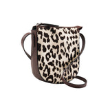 13 of 15:Leopard print handbag with brown leather accents on a white background