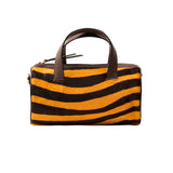 7 of 43:Bag with black and orange striped pattern on a white background