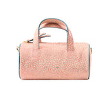1 of 16:Pink textured handbag with gold zipper on a white background