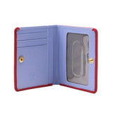 3 of 3:Open purple wallet with red trim on a white background