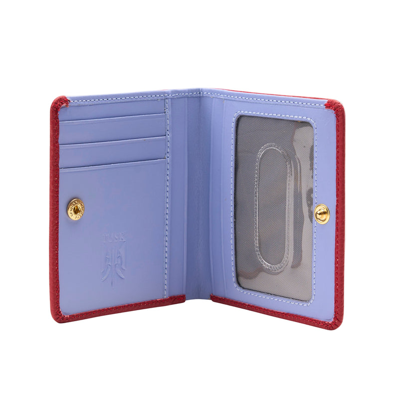 Open purple wallet with red trim on a white background