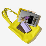 2 of 6:tusk-9940-pebblegrain-leather-tote-bag-lime-still-01- LIME